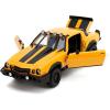 imageJada Transformers Rise of The Beast 124 1977 Chevy Camaro Bumblebee amp Badge DieCast Car Toys for Kids and Adults
